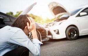 Person distressed viewing a car accident.